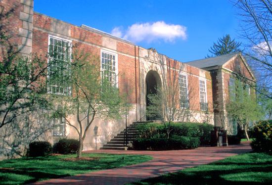 Photo of Chubb Hall on a sunny day, located on College Green